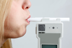 woman-blowing-breathalyzer-1.png