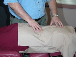 Chiropractic adjustments help reduce pain and improve range of motion