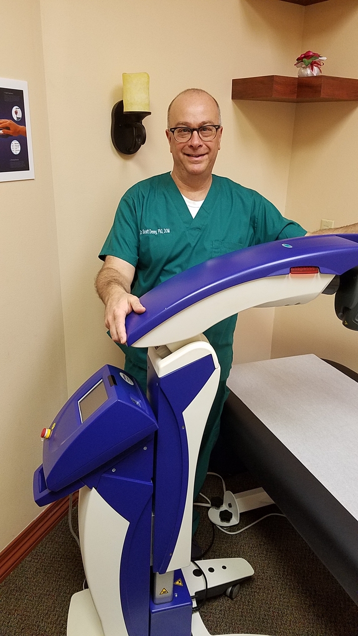 Dr. Denny Performing MLS Laser Therapy in Davie, FL