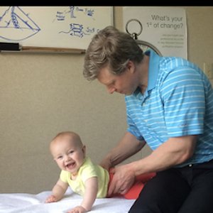 Dr. Voithofer working with pediatric patient